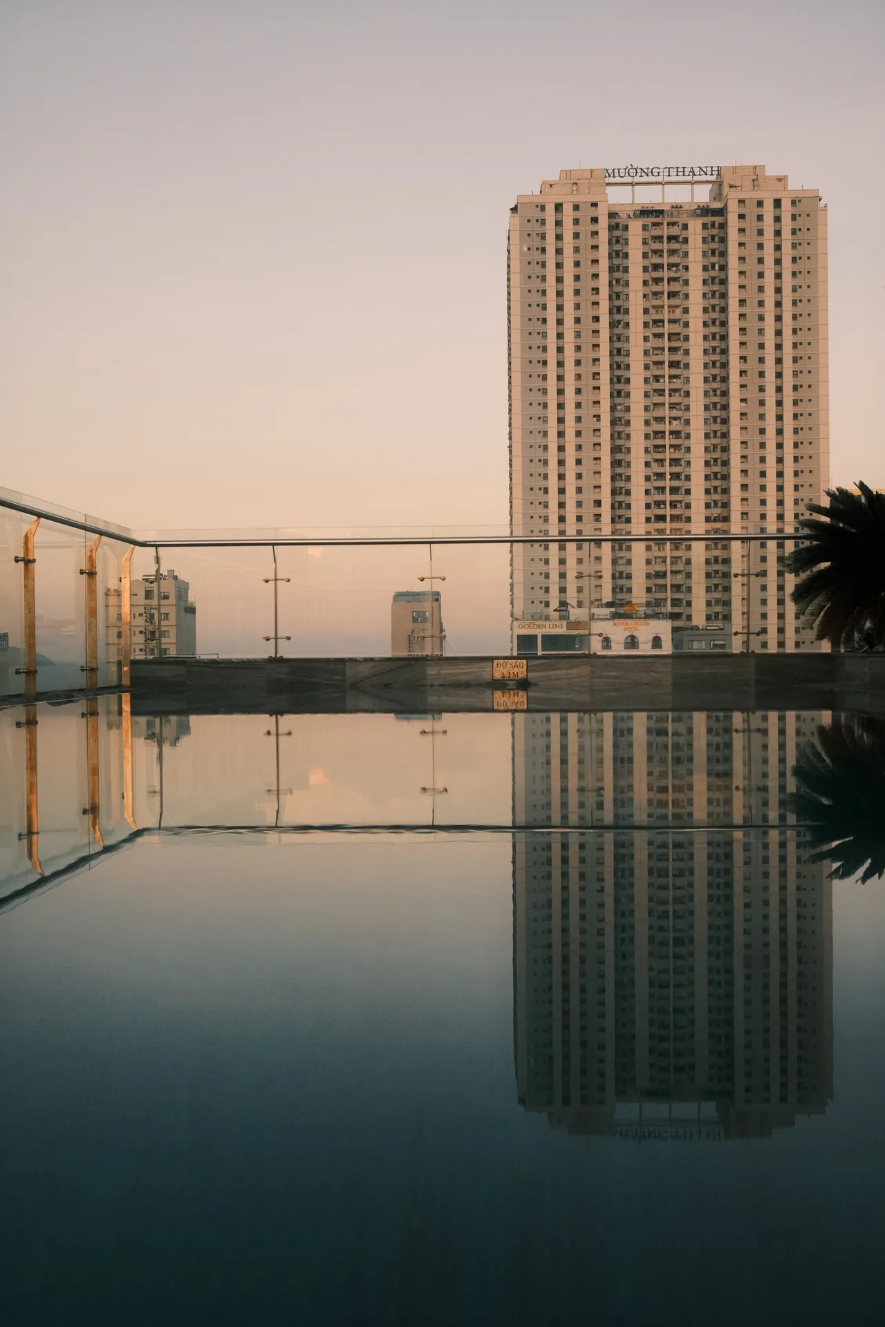 Reflection of a building in the swimming pool